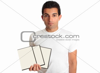 Man holding set DVD movies or games in his hand