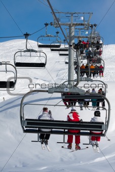 People on a chairlift, ski resort