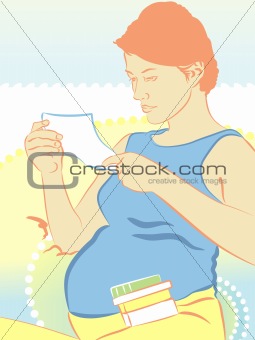 an expectant mother is reading a medicine manual