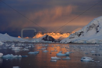 Sunrise and ice floe in Antarctica
