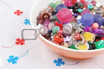 Bowl of beads and buttons