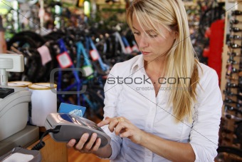 Woman making debit payment