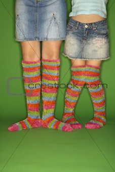 Girls wearing striped socks.