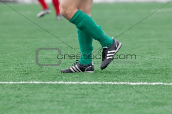 Feet of the football player