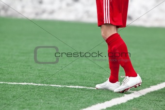 Feet of the football player