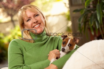 Woman and Jack Russell Terrier Puppy Enjoying a Day on The Sofa.