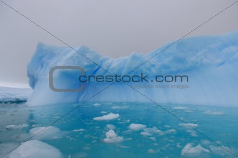Iceberg and azure water