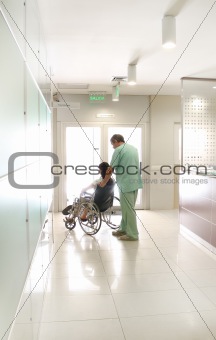 Nurse and a patient using a wheelchair