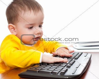 Toddler typing on the keyboard