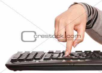 woman's hand pressing enter button