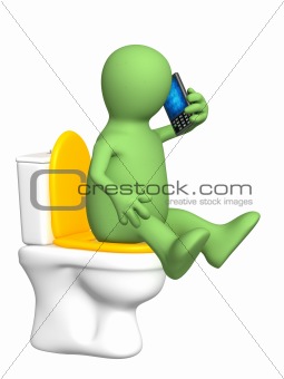 Puppet, sitting with a phone on toilet bowl