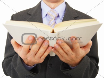 Man reads big book, isolated on white