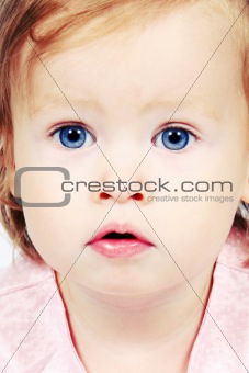 Baby Girl in Dress with Bright eyes