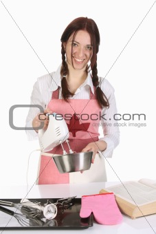 beautiful housewife preparing with kitchen mixer