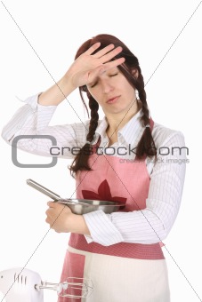 tired housewife preparing with egg beater
