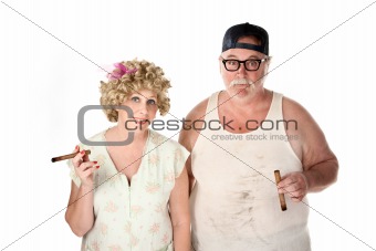 Homely couple with cigars on white background