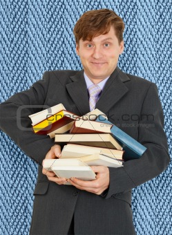 Funny guy with an armful of textbooks