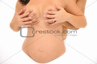 Pregnant couple holding breasts