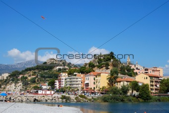 Menton town and red kite