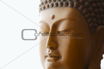 Close up of Buddha head carving