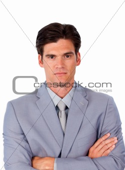 Serious businessman with folded arms 