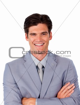 Smiling assertive businessman with folded arms 
