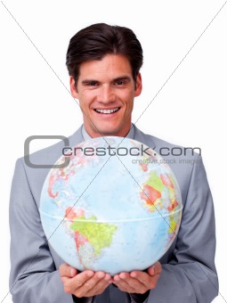 Self-assured businessman holding a terrestrial globe 