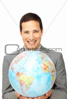 Attractive businessman holding a terrestrial globe 