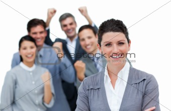 Cheerful business partners punching the air in celebration