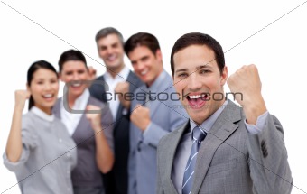 Successful business team punching the air in celebration