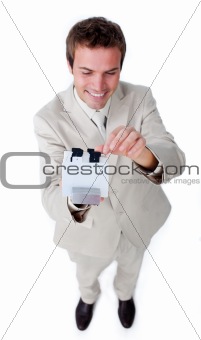 Young caucasian businessman searching for the index 