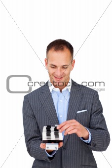 Attractive businessman searching for the index 