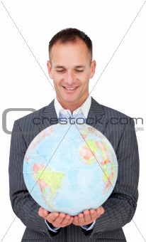 Confident businessman smiling at global business expansion 