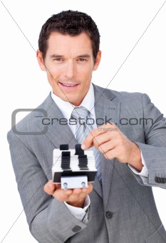 Assertive businessman searching for the index 