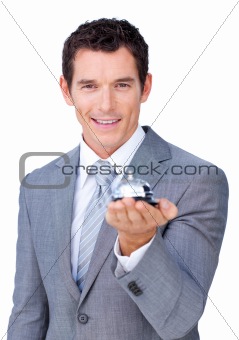 Assertive businessman showing a service bell 