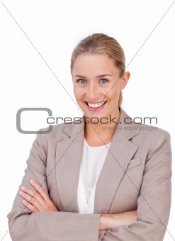 Charismatic blond businesswoman with folded arms 