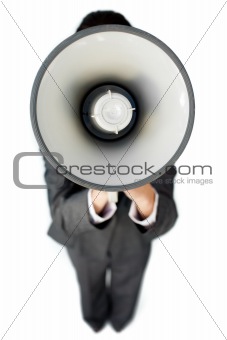 Businesswoman giving instructions with a megaphone 