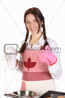 beautiful housewife with electric beater 