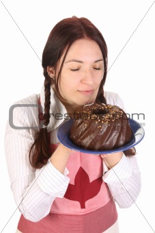 beautiful housewife smelling bundt cake