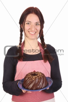 housewife showing off bundt cake 