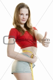 Slim girl with measure tape