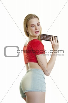 young woman eating chocolate 