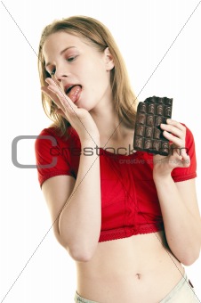 young woman enjoying large  chocolate  bar