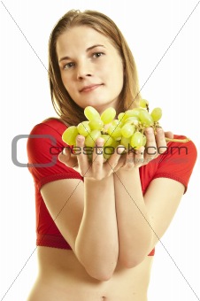 young woman holding  grapes