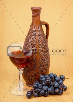 Ceramic jug and a glass