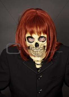Masked man - skeleton in red wig