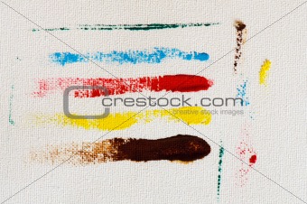 Multicolor brush strokes on canvas
