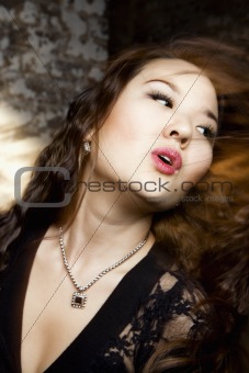 Woman flinging hair