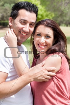Closeup Portrait Of A Cute Couple Hugging