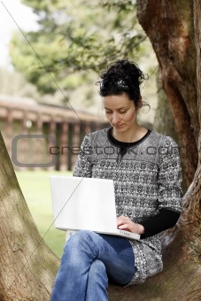 young woman working on laptop
